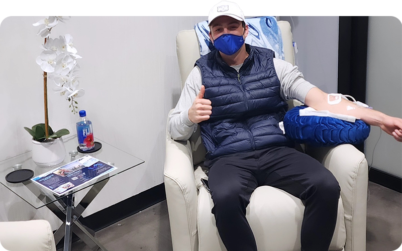 Client receiving an IV drip treatment at Infinite Dripz wellness clinic.