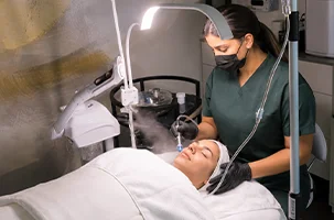 Warm steam opens the pores before suction clears them at a Lakewood HydraFacial appointment