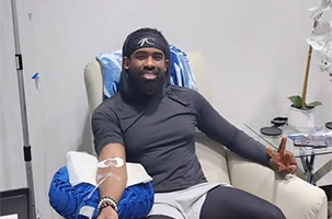 Client receiving IV therapy at Infinite Dripz near Highland Park.